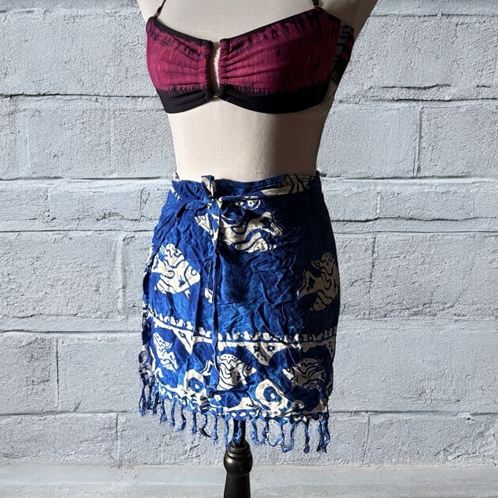 Wrap-a-round swim suit cover up.